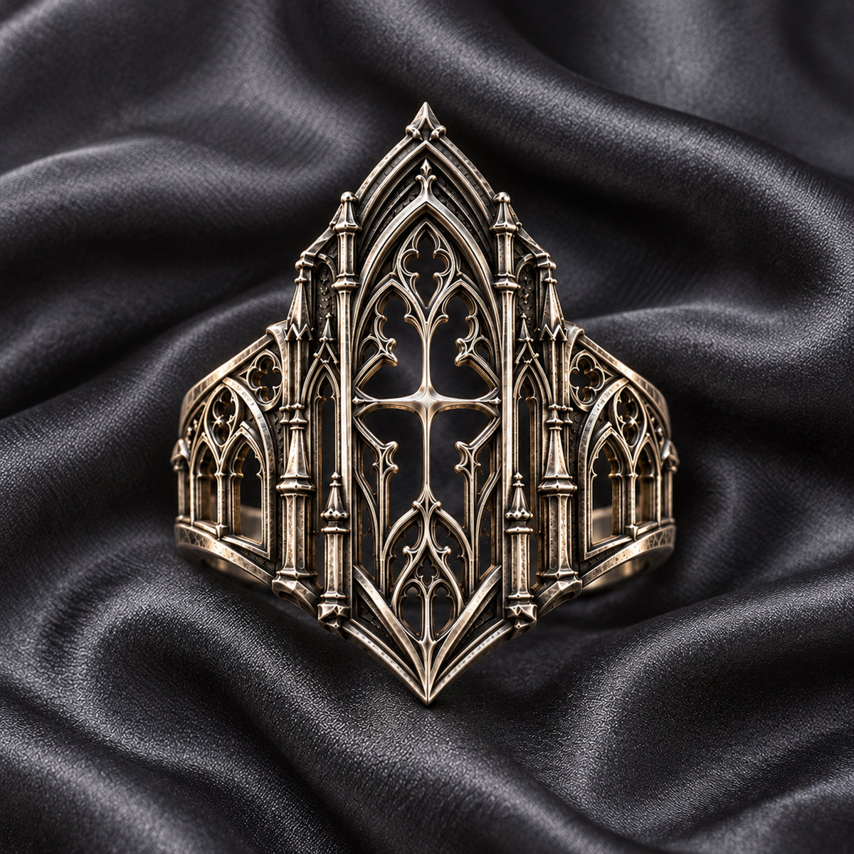 Front Profile of Gothic Cathedral Ring on Dark Satin Fabric