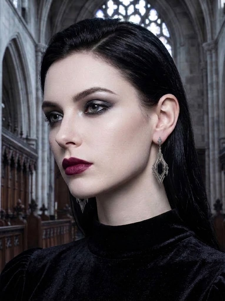 kurgaatelier gothic drop earrings on female model styled with dark academia fashion and oxidized sterling silver architectural aesthetic