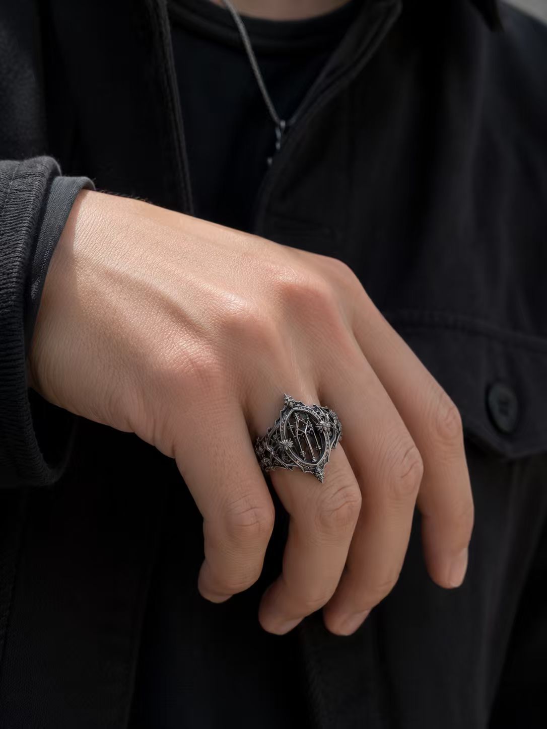 Men's dark gothic cathedral statement ring worn on hand by Kurga Atelier. Solid silver architecture jewelry with honeybee details, ideal for vampire goth style and alternative fashion gifts.