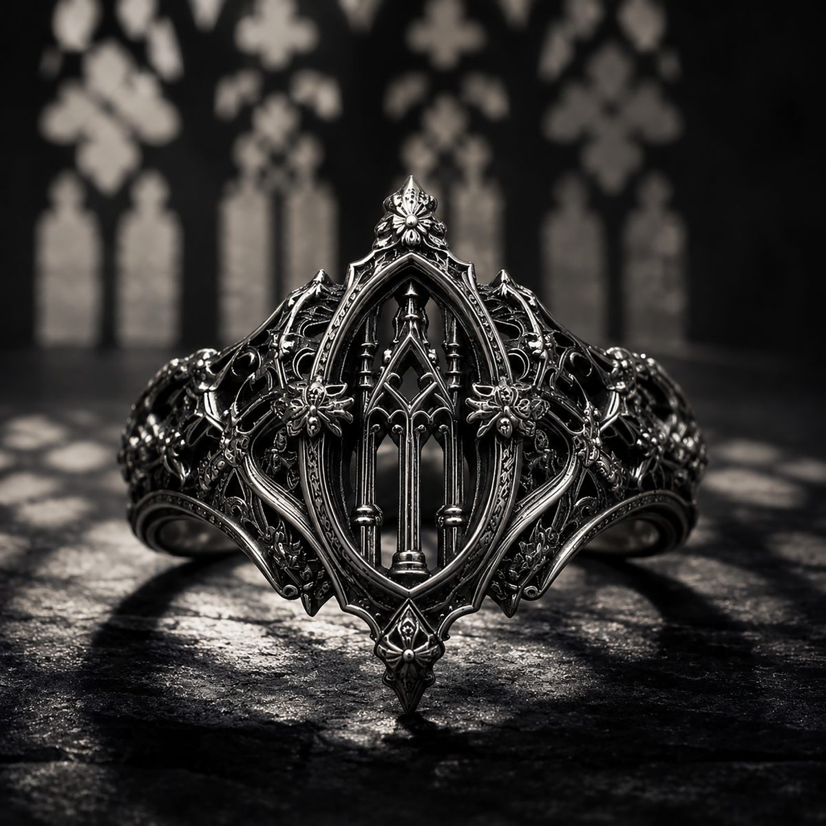 Close-up view of gothic cathedral arched window ring by Kurga Atelier. High-detail solid silver architecture ring with carved honeybees and oxidized vintage patina finish.