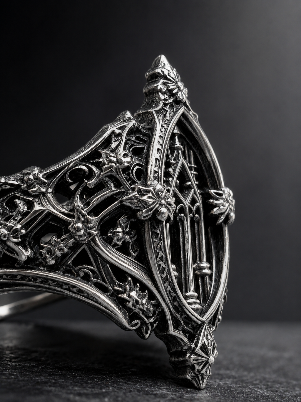 Side angle detail of solid silver gothic cathedral ring by Kurga Atelier showing pointed church arches, heavy 2.3mm band thickness, and filigree honeybee craftsmanship.