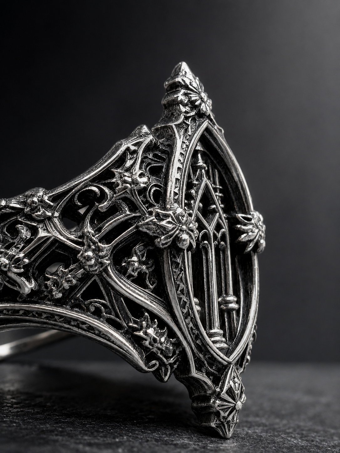Side angle detail of solid silver gothic cathedral ring by Kurga Atelier showing pointed church arches, heavy 2.3mm band thickness, and filigree honeybee craftsmanship.