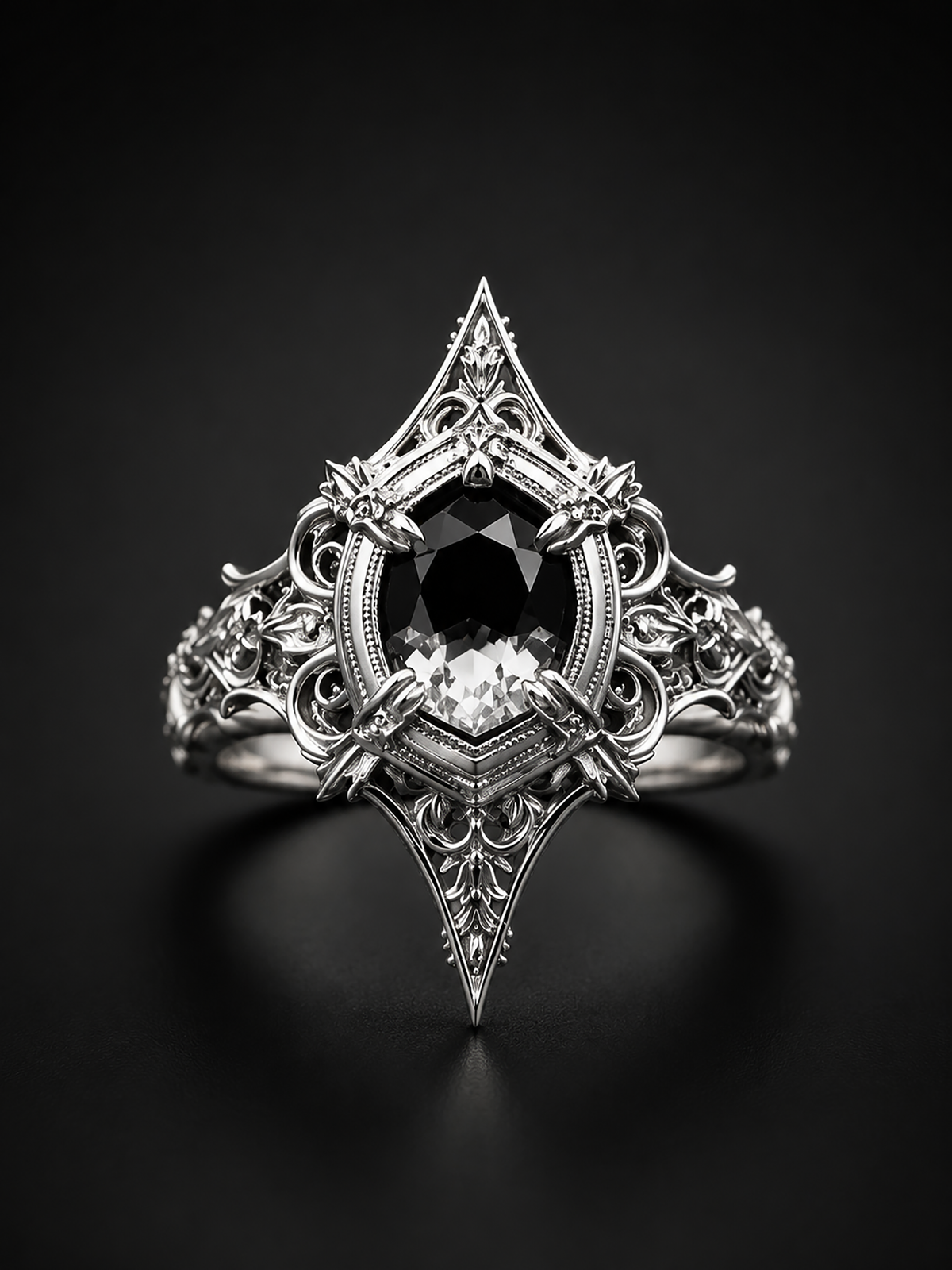 High contrast photo of Kurga Atelier gothic engagement ring. Intricate sterling silver filigree cathedral ring with a kite cut black gemstone centerpiece.
