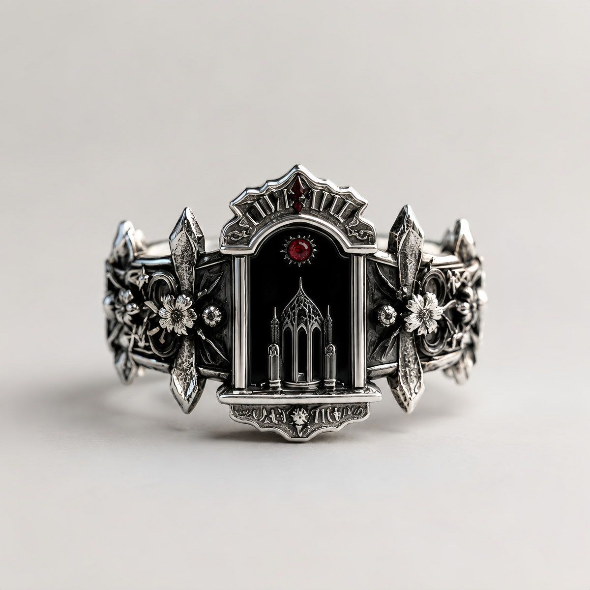 Front view of gothic cathedral reliquary statement ring isolated on a clean white studio background.