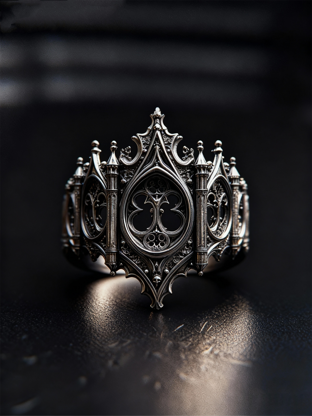 Front view of the Kurga Atelier oxidized sterling silver gothic cathedral ring, featuring intricate architectural pointed arches and hollowed tracery.
