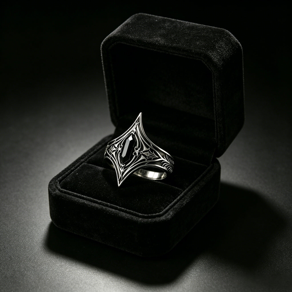 Gothic black onyx silver ring by Kurga Atelier presented in a classic black velvet gift box. Dark academia statement ring ideal for witchy gift giving.