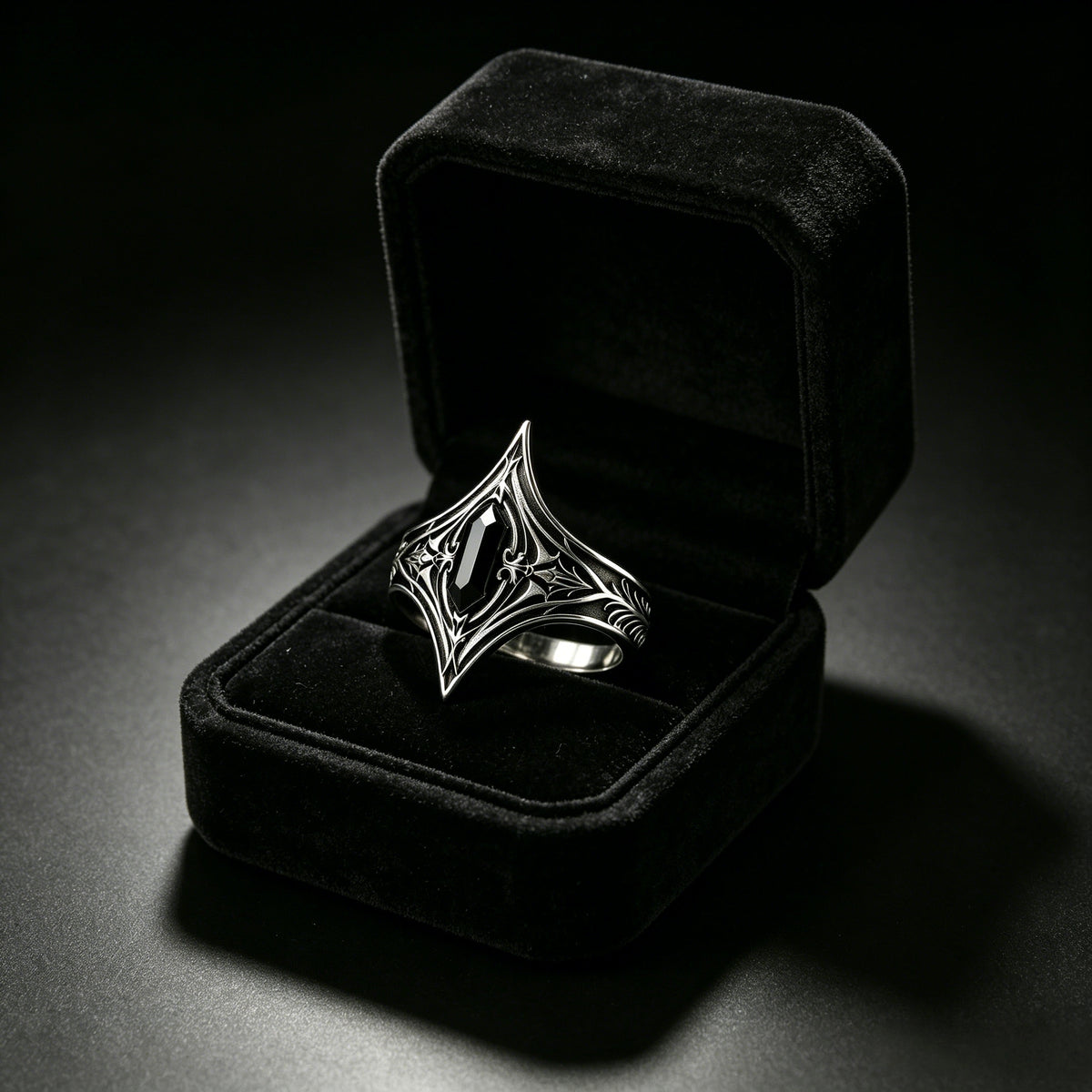 Gothic black onyx silver ring by Kurga Atelier presented in a classic black velvet gift box. Dark academia statement ring ideal for witchy gift giving.