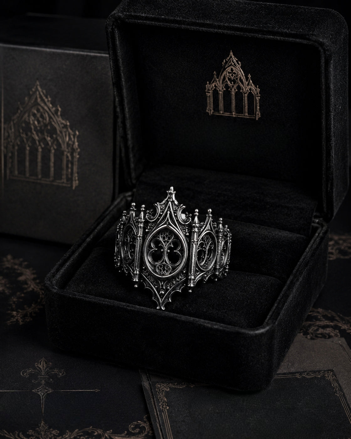 Kurga Atelier gothic cathedral silver ring presented inside a premium black velvet jewelry box with branded gold foil logo.