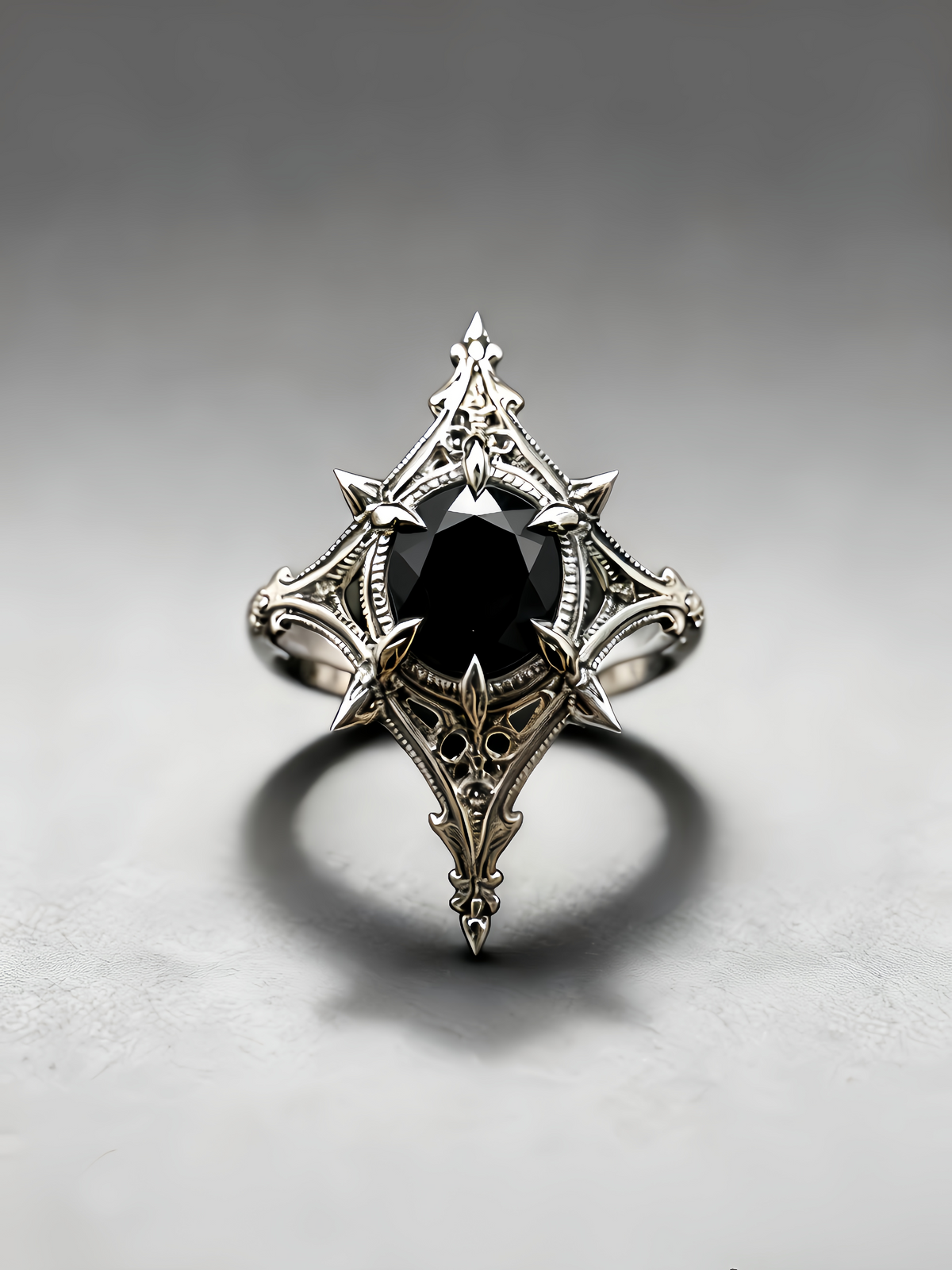 Gothic black onyx ring featuring a dark center gem in a cathedral silver setting, ideal for vampire rings aesthetic and alternative gothic engagement jewelry.
