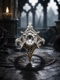 Gothic cathedral engagement ring with a round moissanite center stone, set in oxidized sterling silver with detailed medieval spire carvings against a dark castle background.