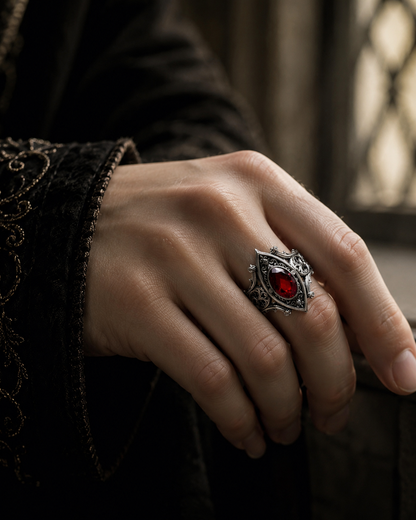 Kurga Atelier Gothic Ruby Silver Ring on hand, handcrafted antique texture shows medieval night luxury.