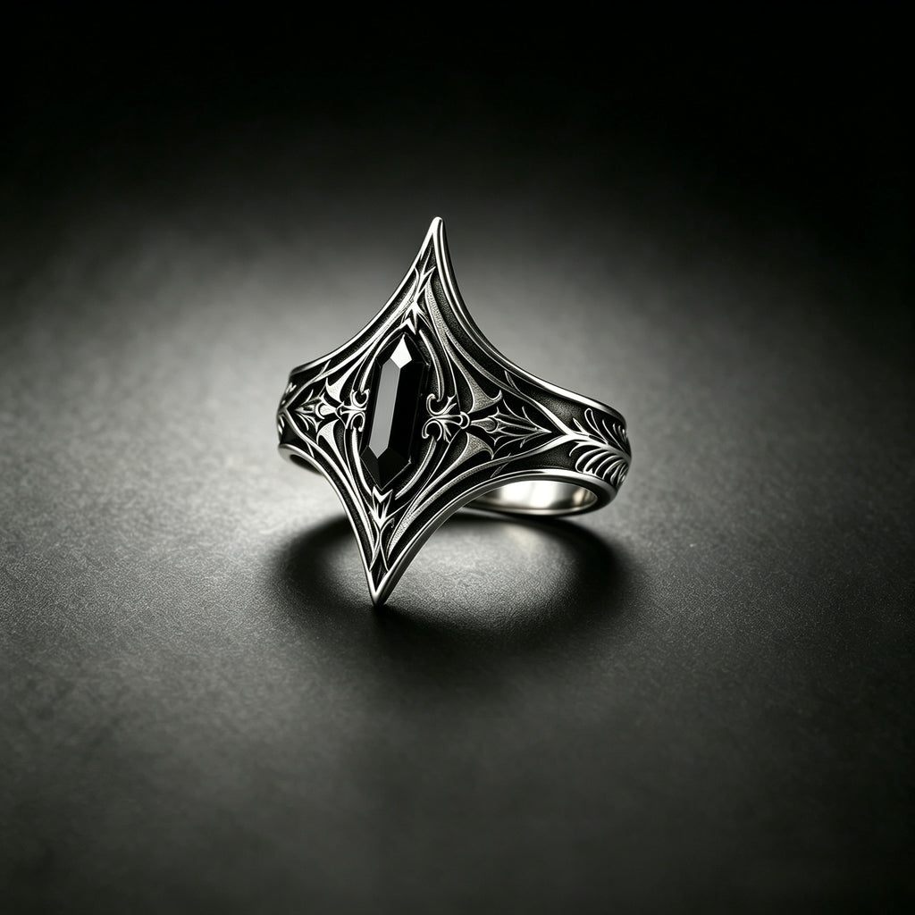 Kurga Atelier dark academia armor ring featuring a black stone set in oxidized sterling silver. Gothic statement ring on dark mysterious background.