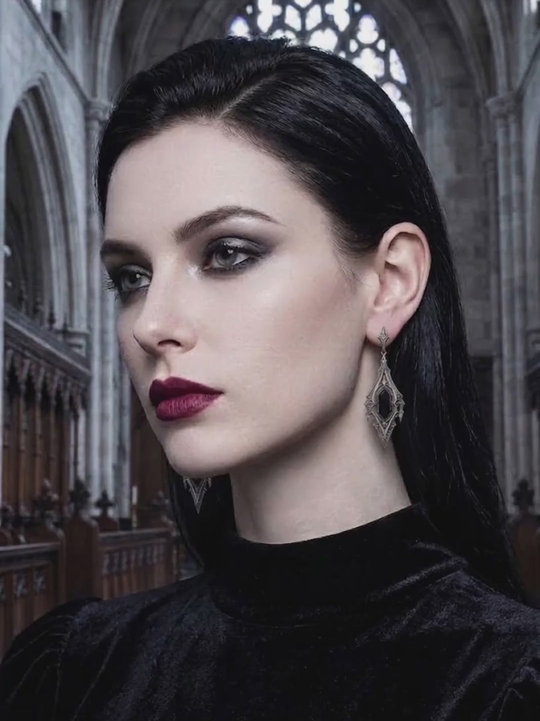 kurgaatelier gothic cathedral drop earrings movement video featuring dark academia model wearing oxidized silver alternative jewelry