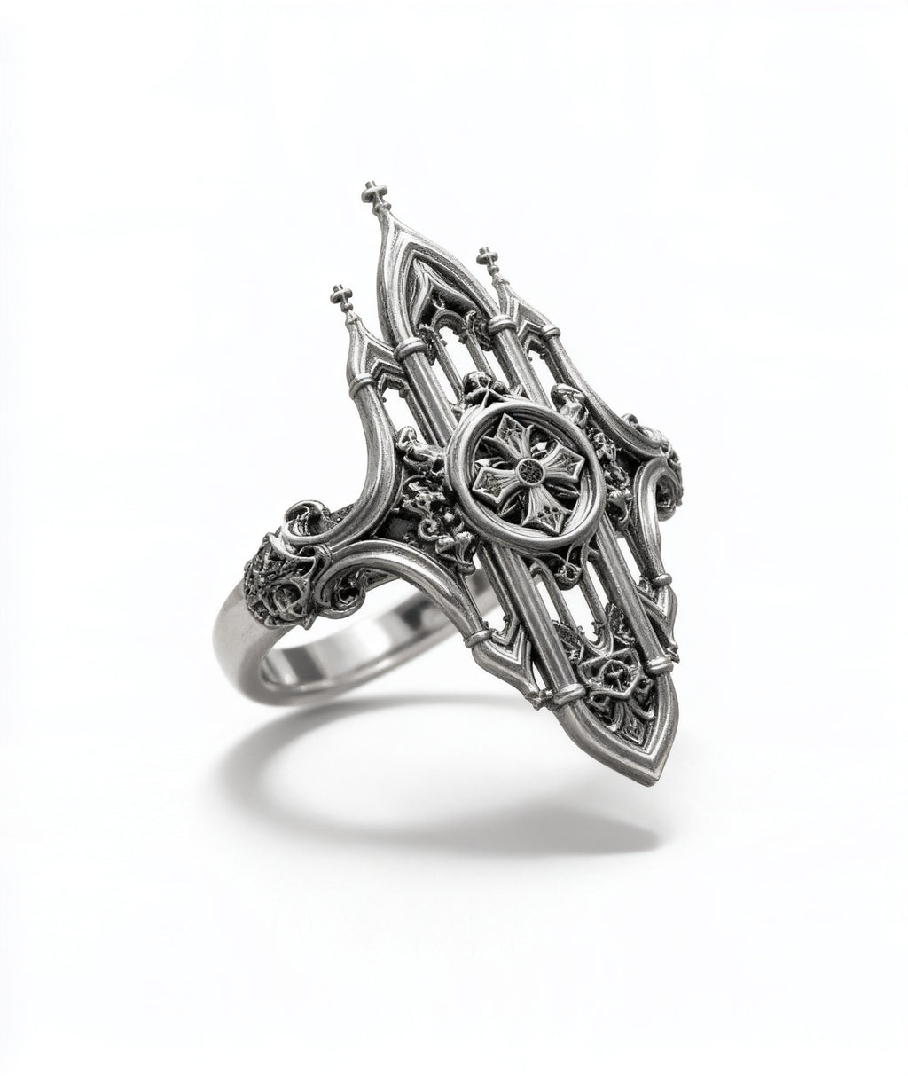 Side angle view of Kurga Atelier Gothic cathedral architecture ring on white backdrop. Demonstrates the wide band design, filigree church spires, and oxidized chunky silver crafting for gothic rings lovers.