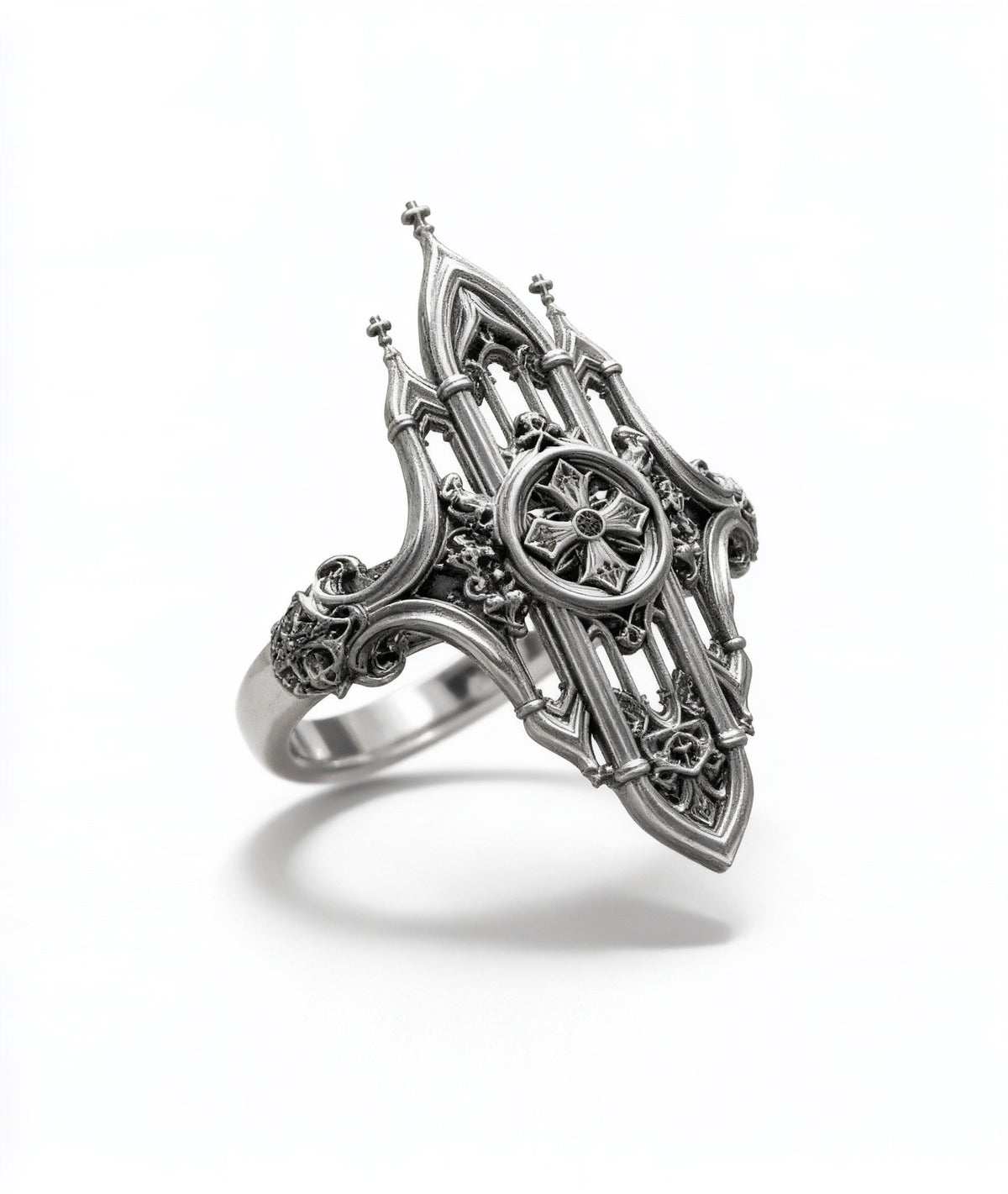 Side angle view of Kurga Atelier Gothic cathedral architecture ring on white backdrop. Demonstrates the wide band design, filigree church spires, and oxidized chunky silver crafting for gothic rings lovers.