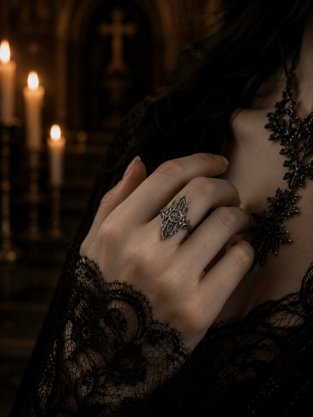 Model wearing the Kurga Atelier Gothic cathedral architecture ring with black lace attire. Intricate chunky silver ring statement jewelry piece for dark academia, vampire goth, and alt engagement styles.